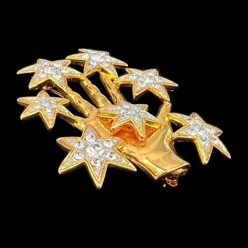 NOLAN MILLER SHINY GOLDEN HAND WITH CRYSTAL STARS BROOCH
